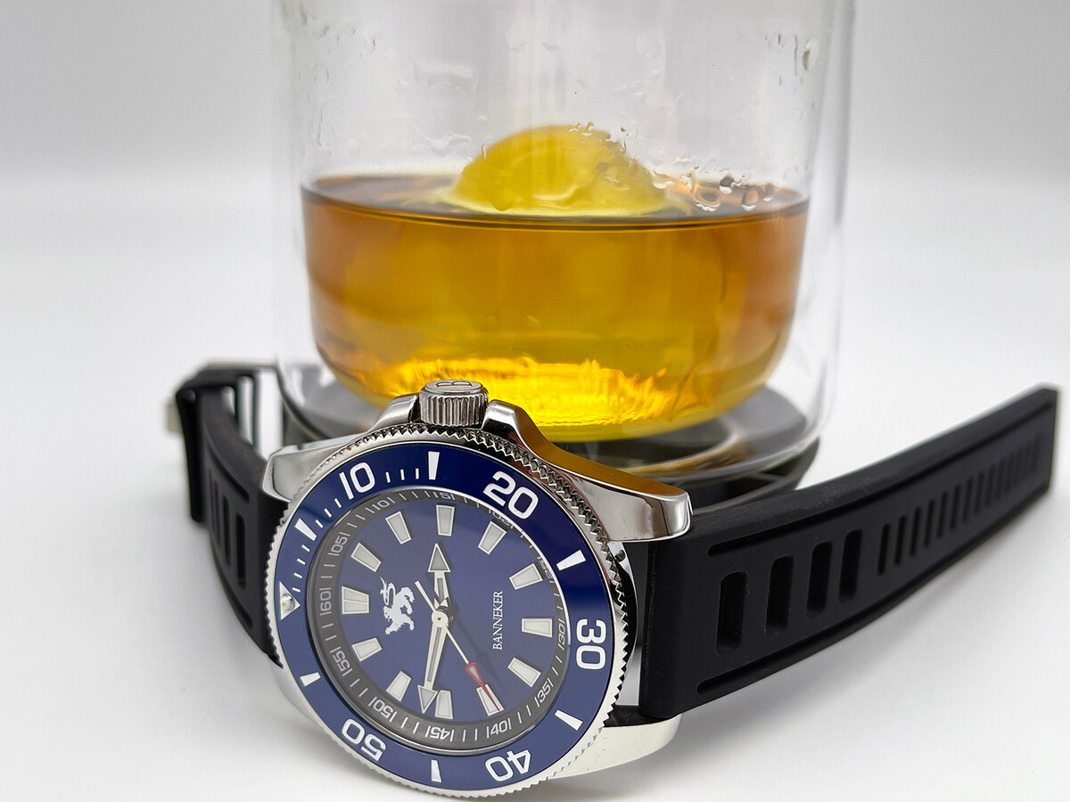 A Banneker diver beside a bourbon glass